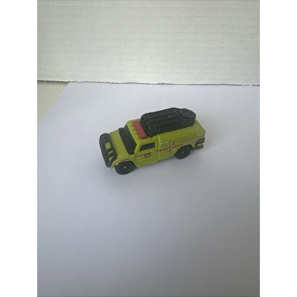 Hasbro TMCM Ratchet Search And Rescue Fire Department Green Vehicle